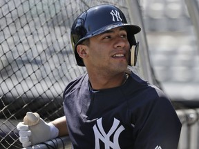 New York Yankees' Gleyber Torres warms-up before the game against the Toronto Blue Jays at Yankee Stadium Sunday, April 22, 2018 in New York.