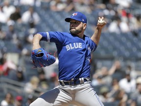 Toronto Blue Jays starting pitcher Jaime Garcia throws during the first inning of the baseball game against the New York Yankees at Yankee Stadium Sunday, April 22, 2018 in New York.