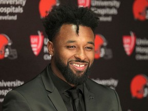 FILE - In this March 15, 2018, file photo, Cleveland Browns' Jarvis Landry speaks at an NFL football press conference in Berea, Ohio. A person familiar with the negotiations says the Browns are close to finalizing a contract extension with star wide receiver Jarvis Landry. The sides remain in talks but expect to get a deal done, said the person who spoke Thursday, April 12, 2018, to The Associated Press on condition of anonymity because the deal has not been finalized.