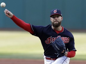 Cleveland Indians starting pitcher Corey Kluber delivers in the first inning of a baseball game against the Detroit Tigers, Monday, April 9, 2018, in Cleveland.