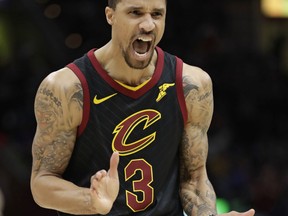 Cleveland Cavaliers' George Hill reacts in the second half of Game 7 of an NBA basketball first-round playoff series against the Indiana Pacers, Sunday, April 29, 2018, in Cleveland. The Cavaliers won 105-101.
