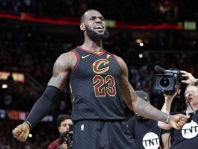 Cleveland Cavaliers' LeBron James reacts after making the game-winning shot in the second half of Game 5 of an NBA basketball first-round playoff series against the Indiana Pacers, Wednesday, April 25, 2018, in Cleveland. The Cavaliers won 98-95.