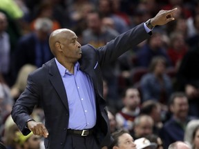 Cleveland Cavaliers interim coach Larry Drew gestures to players during the second half of the team's NBA basketball game against the Toronto Raptors, Tuesday, April 3, 2018, in Cleveland. The Cavaliers won 112-106.