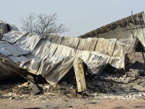 The remnants of a house north of Woodward, Okla., are seen Friday, April 13, 2018, after it was burned in a wildfire Thursday evening. A wildfire in northwestern Oklahoma has burned more than 120,000 acres and forced hundreds of people to evacuate their homes.