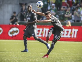 Portland Timbers midfielder Cristhian Paredes boots the ball during the first half of an MLS soccer match against New York City FC in Portland, Ore., Sunday, April 22, 2018.