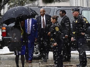 Bill Cosby, center, arrives for jury selection in his sexual assault retrial at the Montgomery County Courthouse, Monday, April 2, 2018, in Norristown, Pa.