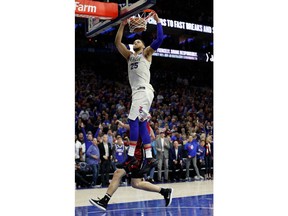 Philadelphia 76ers' Ben Simmons, of Australia, dunks the ball during the second half in Game 2 of a first-round NBA basketball playoff series against the Miami Heat, Monday, April 16, 2018, in Philadelphia. The Heat won 113-103.