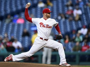 Philadelphia Phillies starting pitcher Ben Lively throws during the first inning of the team's baseball game against the Pittsburgh Pirates, Friday, April 20, 2018, in Philadelphia.