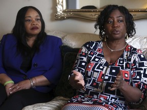 Sandra Thompson, right, speaks alongside Sandra Harrison, both golfers and members of a group of local women known as Sisters in the Fairway, during an interview with The Associated Press, Tuesday April 24, 2018 in York, Pa. Officials at the Grandview Golf Club in York called police on the group Saturday, accusing them of playing too slowly and holding up others behind them. On Sunday club co-owner JJ Chronister told the York Daily Record she called the women personally to "sincerely apologize."