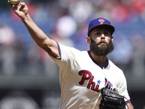 Philadelphia Phillies' Jacob Arrieta throws a pitch during the first inning of a baseball game against the Miami Marlins, Sunday, April 8, 2018, in Philadelphia.