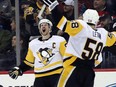 Pittsburgh Penguins captain Sidney Crosby celebrates his overtime goal against the New Jersey Devils on March 29.