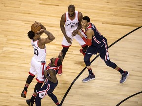 Toronto Raptors guard DeMar DeRozan shoots against the Washington Wizards on April 17.