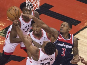 Washington Wizards guard Bradley Beal fights for a rebound against the Toronto Raptors on April 17.