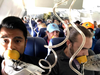 Marty Martinez, left, with other passengers after a jet engine blew out on the Southwest Airlines Boeing 737 plane he was flying in from New York to Dallas, April 17, 2018.