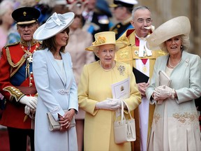 In this April 29, 2011 file photo, from left, Prince Phillip, Carole Middleton, Queen Elizabeth II and Camilla, Duchess of Cornwall stand outside of Westminster Abbey after the Royal Wedding of Prince William and Kate Middleton in London.