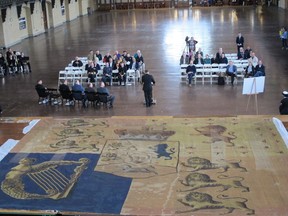 The U.S. Naval Academy Museum holds a public viewing of the British Royal Standard that flew over York (present-day Toronto), Canada, and was captured by U.S. forces during the War of 1812 on Saturday, April 7, 2018 in Annapolis, Md. Congressional and presidential directives from more than 150 years ago require the academy to preserve and exhibit captured flags.