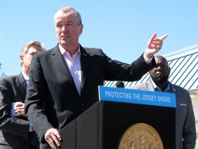 New Jersey Gov. Phil Murphy speaks at a press conference on the boardwalk in Point Pleasant Beach, N.J. on Friday April 20, 2018, before signing a bill banning offshore oil and gas drilling in New Jersey's state waters, as well as prohibiting infrastructure to support drilling in more distant federal waters. New Jersey is one of numerous coastal states using state bans to try to thwart President Trump's plan to open most of America's coastline up to drilling.