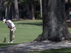 Satoshi Kodaira, of Japan, hits out of the rough of the second fairway during the third round of the RBC Heritage golf tournament in Hilton Head Island, S.C., Saturday, April 14, 2018.