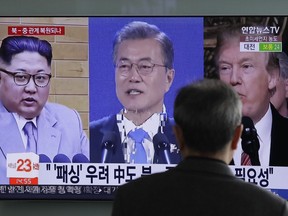 In this March 27, 2018 photo, a man watches a TV screen showing file footages of U.S. President Donald Trump, right, South Korean President Moon Jae-in, center, and North Korean leader Kim Jong Un, left, during a news program at the Seoul Railway Station in Seoul, South Korea. The stakes will be high when North Korean leader Kim Jong Un and South Korean President Moon Jae-in sit down Friday, April 27, 2018 in the no man's land that forms the world's most heavily armed border.