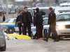 Calgary police investigate a shooting that left three people dead at the Bolsa restaurant on Jan. 1, 2009.