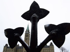 The flag on the Peace Tower flies at half-mast on Parliament Hill in Ottawa on Wednesday, April 25, 2018, following the attacks in Toronto earlier this week.