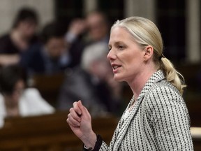 Environment and Climate Change Minister Catherine McKenna stands during question period in the House of Commons on Parliament Hill in Ottawa on Thursday, April 26, 2018. Oilsands projects that use steam to get bitumen from deep below the ground will likely get a pass from new federal environmental assessment rules but the government is still considering what to do if the companies turn to solvents instead of water.