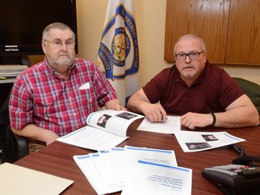 Ernest LeBlanc, left, of Sydney Mines, N.S., and Sean Kelly, director of Corrections Canada Nova Scotia, pose in Sydney, N.S., on Thursday, March 22, 2018. LeBlanc and Kelly collaborated on a report into the death of Ernest's son, Jason LeBlanc.