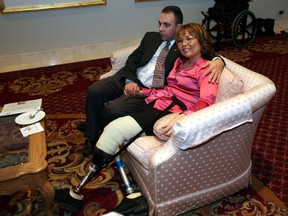 Then-democratic candidate Tammy Duckworth and her husband Bryan Bowlsbey watch election returns on November 7, 2006 in Oakbrook, Illinois. Duckworth,50, who is now a U.S. senator has become the first to give birth while in office