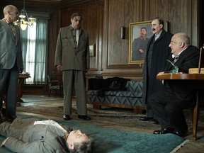 Actor Jeffrey Tambor, third from left, appears in a scene from The Death of Stalin.