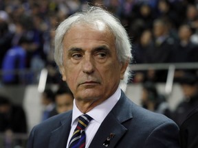 In this Nov. 15, 2016 photo, Japan's coach Vahid Halilhodzic is seen before their 2018 World Cup Russia qualifier soccer match against Saudi Arabia, at Saitama Stadium, in Saitama, north of Tokyo.  Halilhodzic is expected to be dismissed as Japan's head coach on Monday, April 9, 2018, following two disappointing international friendly matches and with the World Cup opening in just over two months.