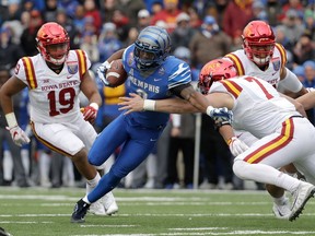 FILE -- In this Dec. 30, 2017, file photo, Memphis wide receiver Anthony Miller (3) pushes past Iowa State linebacker Joel Lanning (7) to score a touchdown in the Liberty Bowl NCAA college football game in Memphis, Tenn. Miller is trying really hard to follow the advice given to him at the NFL combine. Just slow down, just enough to stay focused and avoid making a mistake simply because the wide receiver is moving too fast. That's easier said than done for the man who had no offers from any FBS college school coming out of high school who chose to walk on at Memphis. Miller is in a hurry to prove he's the best wide receiver available in the 2018 NFL draft.