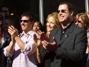 Cruise, Travolta at the opening of the Church of Scientology, Mission of SoMa September 29, 2001 in San Francisco.