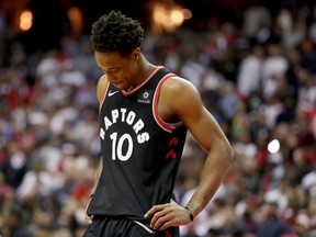 Toronto Raptors guard DeMar DeRozan looks down in the closing seconds of a loss to the Washington Wizards on April 22.