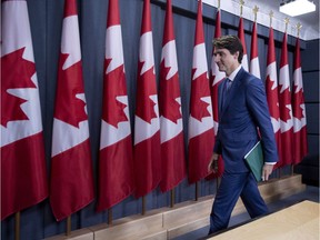 Prime Minister Justin Trudeau leaves a press conference on his meeting with Alberta Premier Rachel Notley and B.C. Premier John Horgan on the deadlock over Kinder Morgan's Trans Mountain pipeline expansion, in Ottawa on Sunday, April 15, 2018.