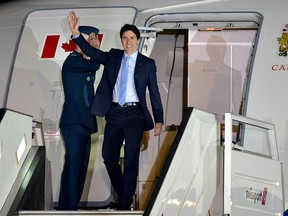 Prime Minister Justin Trudeau arrives at the Peruvian air force base in Callao, Lima, on April 12, 2018, to take part in the Summit of the Americas.