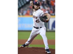 Houston Astros starting pitcher Gerrit Cole delivers during the first inning of a baseball game against the Los Angeles Angels, Monday, April 23, 2018, in Houston.