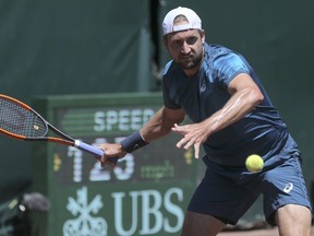 Tennys Sandgren plays against Steve Johnson, both of United States, during the first set of the U.S. Men's Clay Court tennis Championship final at River Oaks Country Club on Sunday, April 15, 2018, in Houston. Johnson took this set 7-6.