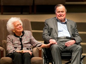 FILE - In this March 8, 2017, file photo, the Mensch International Foundation presented its annual Mensch Award to former U.S. President George H.W. Bush and former first lady Barbara Bush at an awards ceremony hosted by Congregation Beth Israel in Houston. Barbara Bush, the snowy-haired first lady whose plainspoken manner and utter lack of pretense made her more popular at times than her husband, President George H.W. Bush, died Tuesday, April 17, 2018. She was 92.