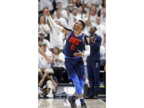 Oklahoma City Thunder guard Russell Westbrook (0) reacts after collecting a foul in the first half during Game 4 of an NBA basketball first-round playoff series against the Utah Jazz, Monday, April 23, 2018, in Salt Lake City.