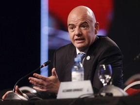 FIFA President Gianni Infantino speaks during the annual conference of the South American Football Confederation, CONMEBOL, in Buenos Aires, Argentina, Thursday, April 12, 2018. The governing body of South American soccer has asked FIFA to expand the World Cup to 48 teams for the 2022 tournament in Qatar.