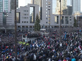 The square echoed with thousands of people singing O Canada as the end of the event drew to a close Sunday night. Before the vigil, thousands took part in what was billed as a walk of “healing and solidarity,” roughly following the route of last Monday’s attack that left 10 people dead and more than a dozen injured.