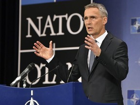 NATO Secretary General Jens Stoltenberg speaks during a media conference at NATO headquarters in Brussels on Thursday, April 26, 2018.