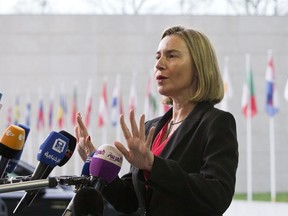 European Union foreign policy chief Federica Mogherini speaks with the media as she arrives for a meeting of EU foreign ministers at the EU Council building in Luxembourg on Monday, April 16, 2018.