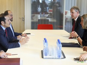 Qatari Foreign Minister Sheikh Mohammed bin Abdulrahman Al Thani, second left, speaks with European Union foreign policy chief Federica Mogherini, second right, during a meeting on the sidelines of a conference on 'Supporting the future of Syria and the region' at the EU Council building in Brussels, Wednesday, April 25, 2018.