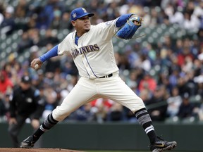 Seattle Mariners starting pitcher Felix Hernandez throws against the Oakland Athletics in the first inning during a baseball game Sunday, April 15, 2018, in Seattle.