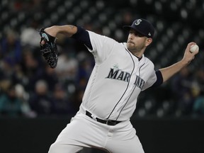 Seattle Mariners starting pitcher James Paxton throws against the Houston Astros in the first inning of a baseball game, Monday, April 16, 2018, in Seattle.