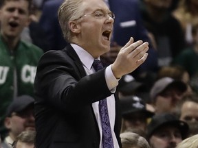 Milwaukee Bucks head coach Joe Prunty yells during the first half of Game 3 of an NBA basketball first-round playoff series against the Boston Celtics Friday, April 20, 2018, in Milwaukee.