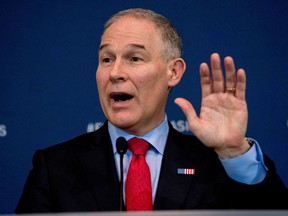 FILE - In this April 3, 2018, file photo, Environmental Protection Agency Administrator Scott Pruitt speaks at a news conference in Washington. An internal government watchdog says the EPA violated federal spending laws when purchasing a $43,000 soundproof privacy booth for Pruitt to make private phone calls in his office.