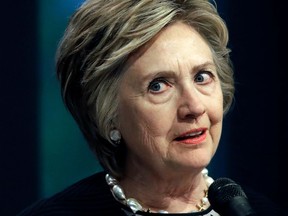 FILE - In this June 5, 2017 photo, former Secretary of State Hillary Clinton speaks at a fundraiser for the Elijah Cummings Youth Program in Israel in Baltimore. Almost 18 months have passed since Hillary Clinton lost the presidency. She holds no position of power in government or in her political party. And she is not expected to run for office ever again. Yet Clinton is starring in the Republican Party's 2018 midterm strategy.