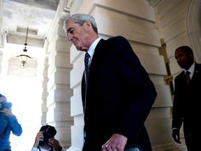 FILE - In this June 21, 2017, file photo, former FBI Director Robert Mueller, the special counsel probing Russian interference in the 2016 election, departs Capitol Hill following a closed door meeting in Washington. Republican senators are promoting an alternative to bipartisan legislation that would protect special counsel Mueller's job _ a nonbinding resolution endorsing him.